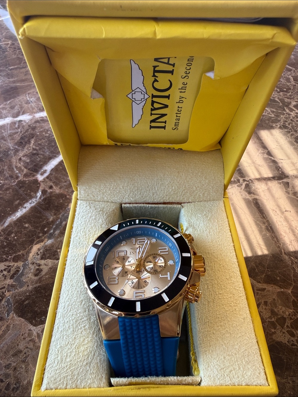 Invicta Gold-Tone Chronograph with Blue Strap and Black Bezel